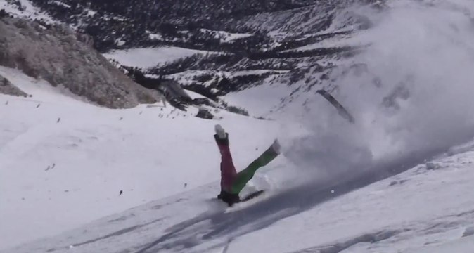 Skier Tumbles Down Slope