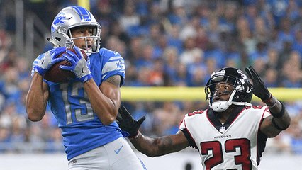 T.J. Jones takes big hit, hangs on for 29-yard gain