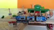 BRIO and Plan City Toy passenger trains, cargo train and bus riding on wooden railway and road.