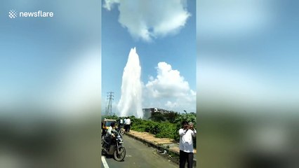 Water pipleline bursts forming spectacular plume
