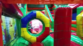 Childrens playground fun.Big slider at indoor playground