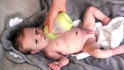 Showing Babys Flexibility and “Drink & Wet” System - 19 Silicone Baby Bunny #2 of 6 by An Huang