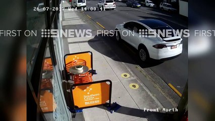 Tesla Model X door torn off by passing truck