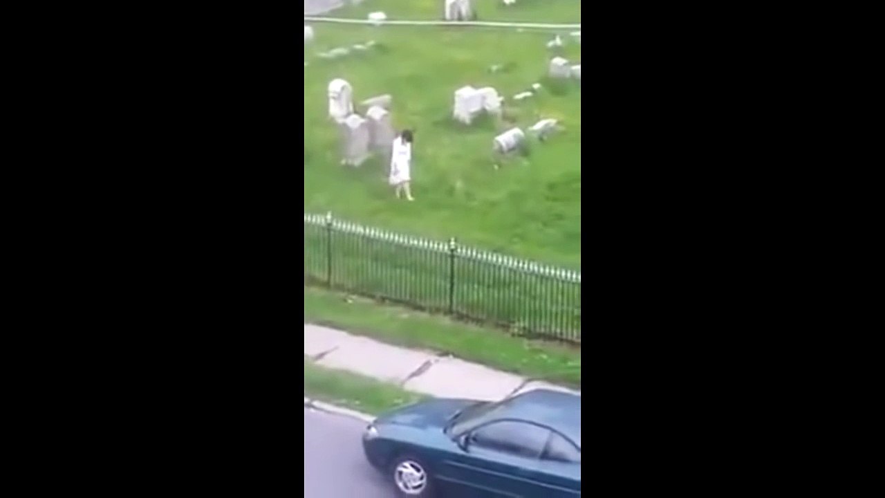 Scary video of a ghost girl walking in the cemetery | Scary videos of ghosts caught on tape