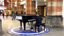 10 year old kid plays piano instrumental version Let it go Frozen NS Amsterdam Central Station