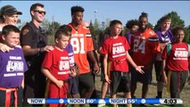 Cleveland Browns Players, Police Officers Team up at Youth Football Practice