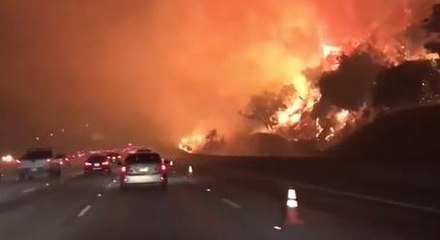 Hellish Footage Of A Wildfire Creeping Up On A California Highway