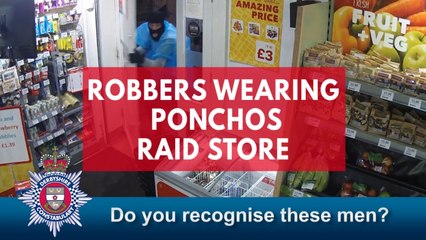 Video shows robbers wearing ponchos raiding store