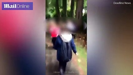 disturbing video shows a schoolgirl throw another young teenager to the ground and viciously pull her hair.