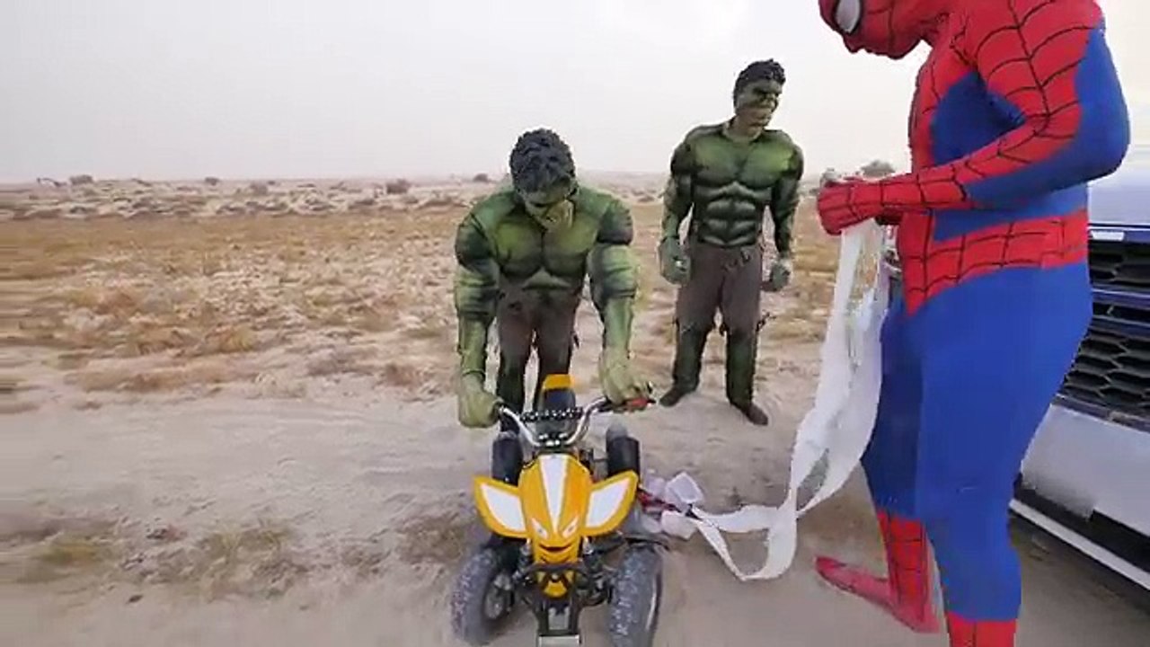 Spiderman TOWING Hulks CAR STUCK in Sand ! with Ride on POWER WHEELS QUAD