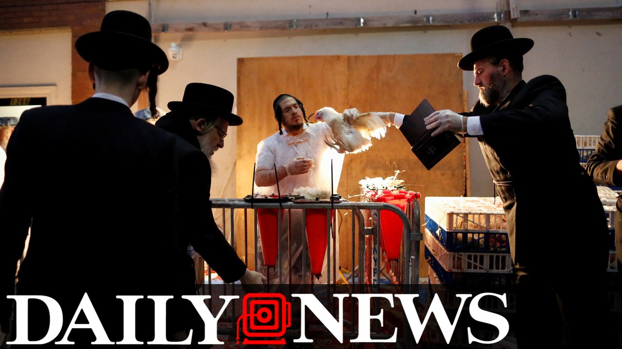 Animal rights activists protest animal cruelty at a Yom Kippur ceremony