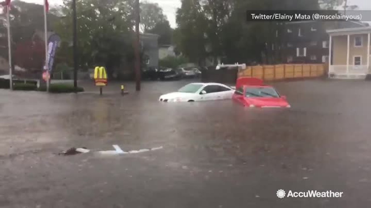 Severe flooding leaves cars underwater in Massa...