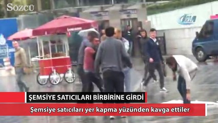 Taksim'de şemsiye satıcılarının meydan kavgası