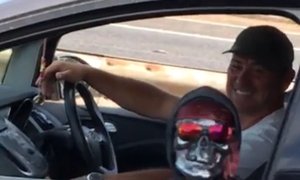 Kid In A Mask Is Here To Make Sure You're Never Bored While You're Driving