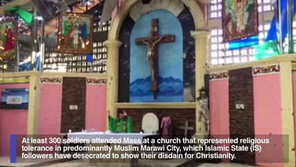 Sound of bombs, gunfire blends with Marawi Mass hymns