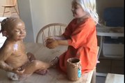 Sister Covers Baby Brother in Peanut Butter