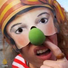 Clown masks ridicule Austria's veil ban