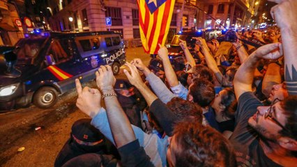 Download Video: Protesters urge national police to leave Catalonia after crackdown