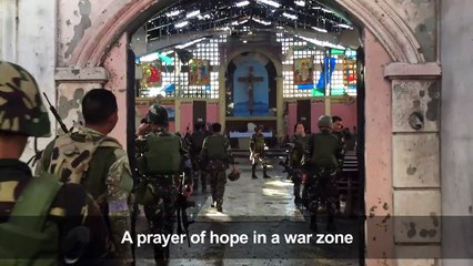 Philippines soldiers attend mass in Marawi
