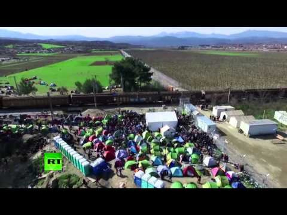 RAW: Drone buzzes over thousands of refugees stranded at Greek border