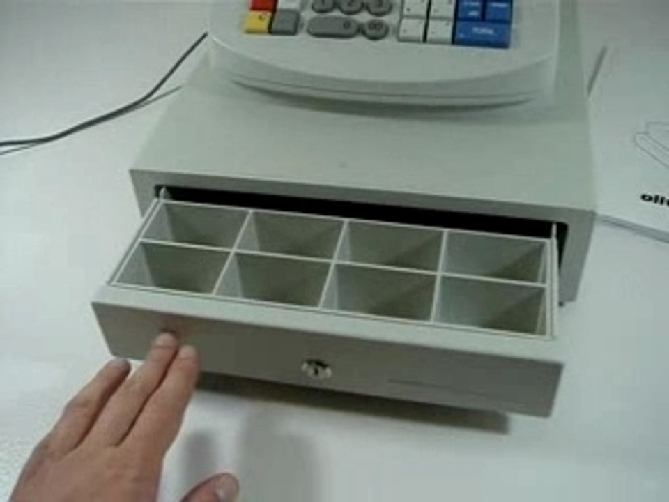 Caisse Olivetti en fonctionnement