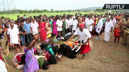 Indian Women Line Up to Get Whipped By Priests to Cast Away Evil Spirits