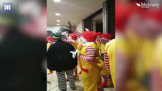 Gang Of Ronald McDonald's Taunt Staff At A Burger King Branch