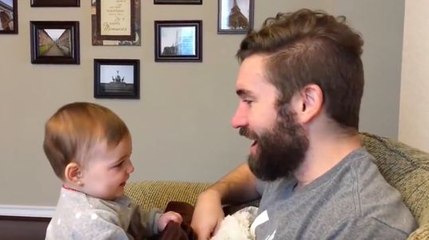 Apparemment cette petite fille n'aime pas son papa sans barbe !
