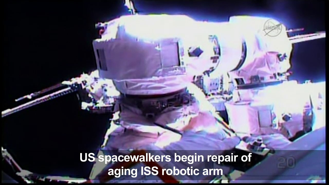 US spacewalkers begin repair of aging ISS robot...