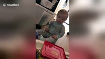 Baby gets terrified by Jack-in-the-box