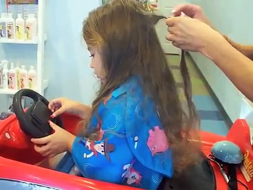 Cute Little Girl at 1st Hair Cut Large