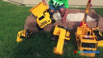 Step2 Sandbox Construction Vehicles Dump Truck with Toy Cars and Trains