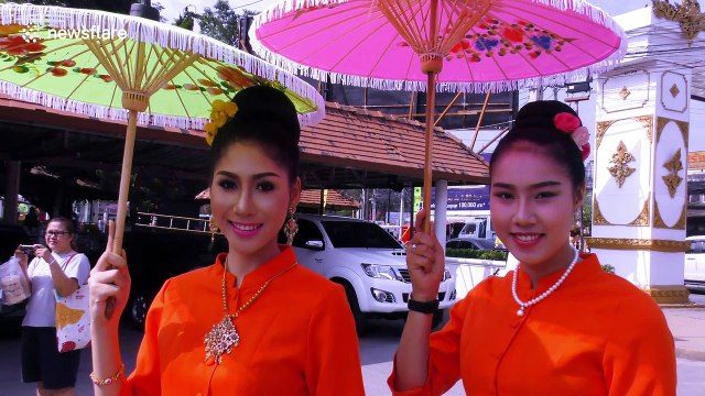 Tourists attend Thailand's colourful umbrella festival