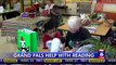 Young Students, Elderly Volunteers Come Together to Improve Literacy