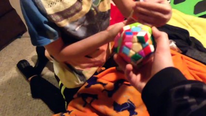 Psycho kid rages at Rubiks cube