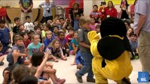 Soldier Dad Appears As School's Mascot And Surprises Sons!