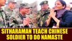 Defence Minister Nirmala Sitharaman teach 'Namaste'to Chinese soldier, Watch | Oneindia News