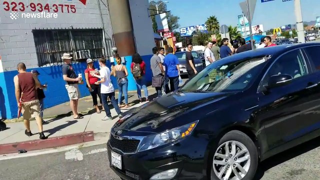 Queues for McDonald's Szechuan Sauce snake around block