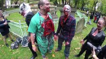 Zombies walk through the streets of London for charity