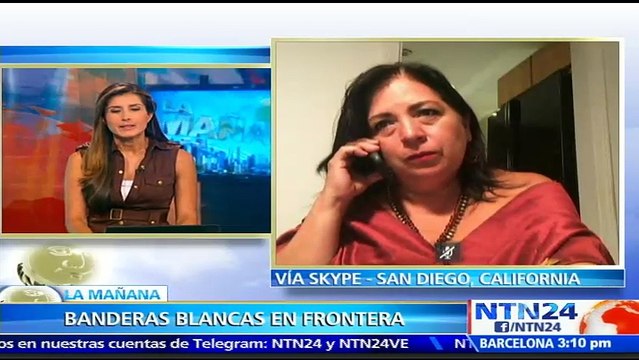 Artista mexicana Betsabeé Romero rindió homenaje a inmigrantes con 100 banderas blancas en muro entre Tijuana y San Dieg