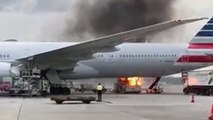 Fire breaks out next to American Airlines jet at Hong Kong airport