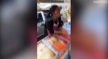 Fruit seller really doesn't want to move...