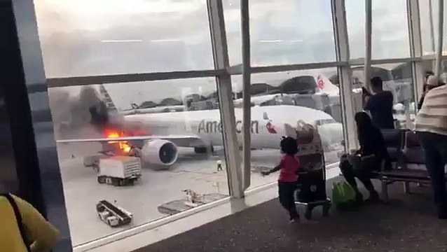 Cargo hold of American Airlines Boeing 777 caught fire at Hong Kong Airport