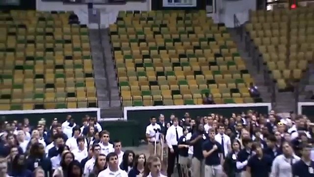 U.S. Marine Surprises Little Sister at High School Graduation Practice