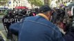 France: Tear gas and arrests at Paris protest against Macron's planned labour and tax reforms