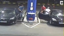 Incredible moment irate gas station attendant puts out ignorant driver’s cigarette by hosing him down with a fire extinguisher