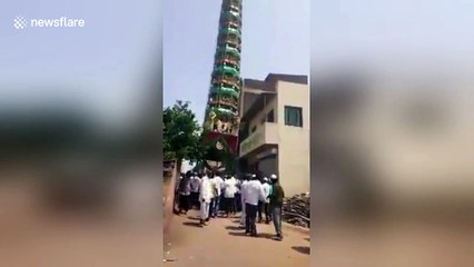 Devotees run as incredibly tall ‘tazia’ tower collapses