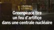 Des militants de Greenpeace tirent un feu d’artifice dans le site d’une centrale nucléaire