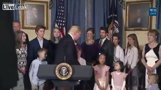 Trump ignores disabled boy who holds out had to shake