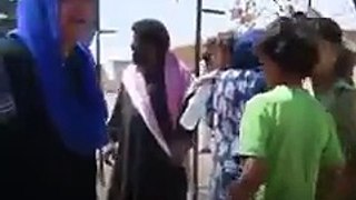 Muslim women in Raqqa, Syria burn their veils after being liberated from ISIS.
